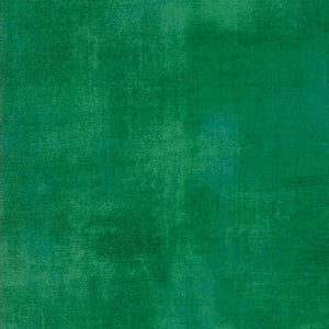 Solid green color swatch with a textured pattern