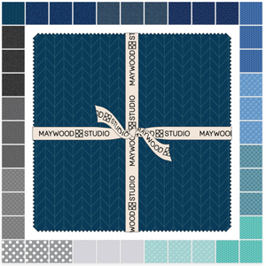 A collection of fabric swatches from Maywood Studio KimberBell Basics Maritime Layer Cake, showcasing a variety of colors including blue, gray, and multicolor patterns.