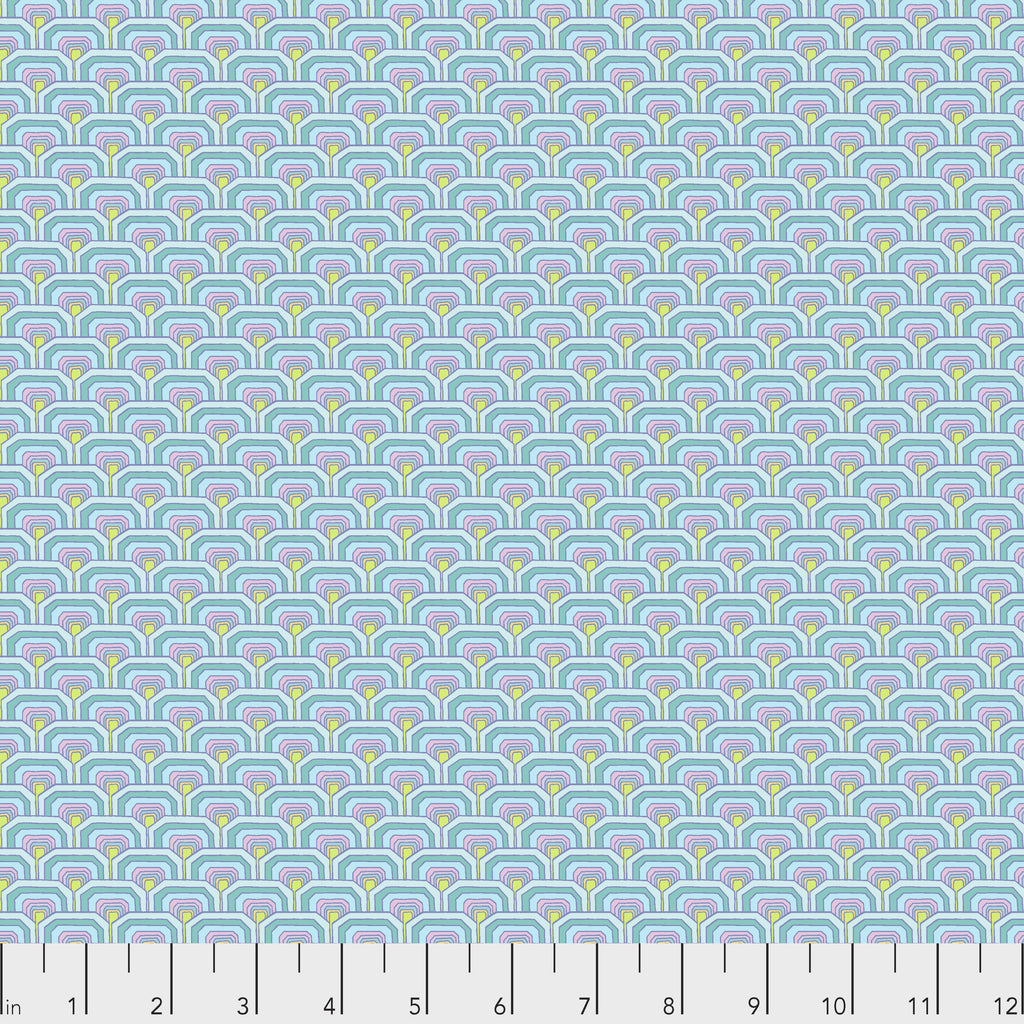 Patterned fabric with geometric design on a light blue background