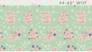 Patterned fabric with decorative elements on a green background