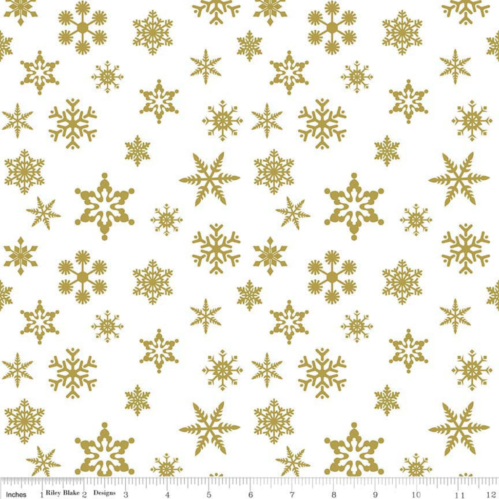 A fabric featuring a pattern of metallic gold snowflakes on a white background.