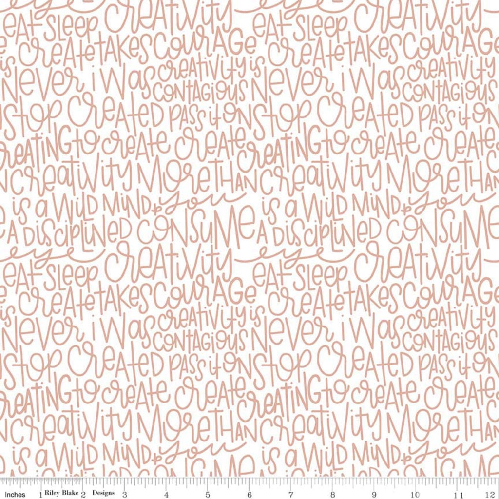 A textured metallic rose gold fabric with a pattern of text in a bold font, likely intended for crafting or fashion design.