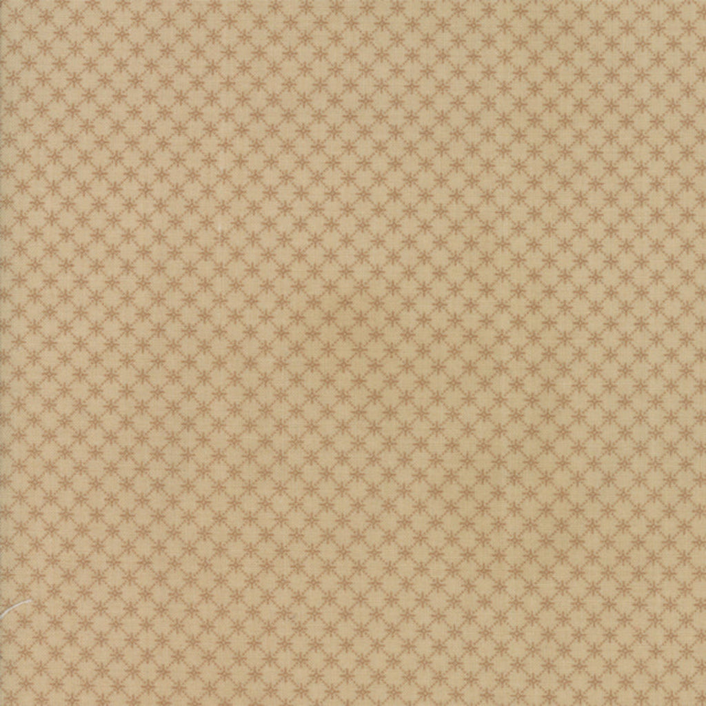 Close-up of a brown cotton fabric with a textured design