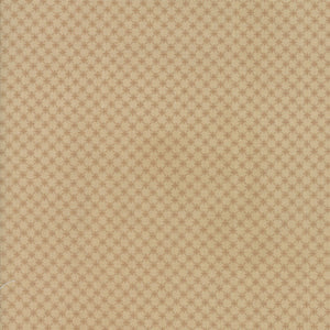 Close-up of a brown cotton fabric with a textured design
