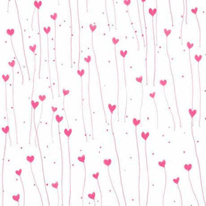 A fabric with a pattern of white and pink hearts and hearts-shaped seashells.
