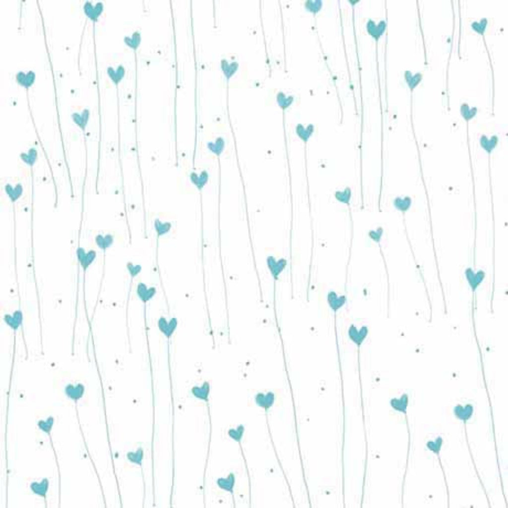 A fabric with a pattern of white and teal hearts and dots.