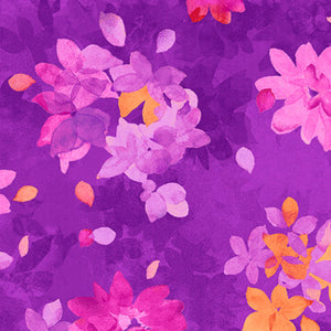 A purple fabric with a watercolor floral pattern in pink, orange, and gold hues.