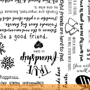 A piece of fabric from the 'Be Mindful, Friendship' collection by Whistler Studios, featuring a variety of written phrases in different fonts and sizes on a black background.