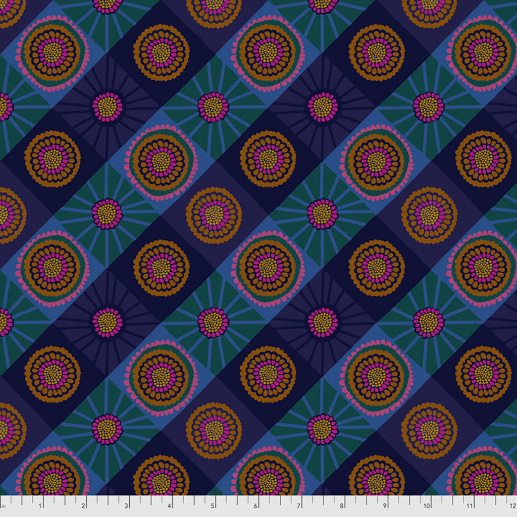 A fabric with a repeating geometric pattern featuring circles and spirals in shades of blue and purple.