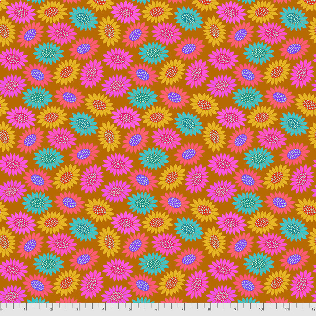 A fabric featuring a pattern of embroidered flowers in pink, blue, and yellow on a brown background.