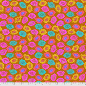 A fabric featuring a pattern of embroidered flowers in pink, blue, and yellow on a brown background.