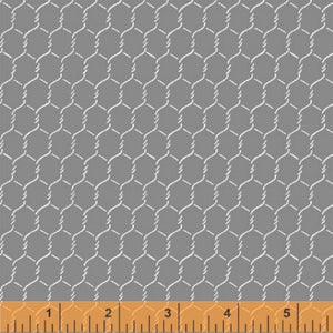 A textured grey fabric with a chicken wire pattern, marked with a tape measure for scale.