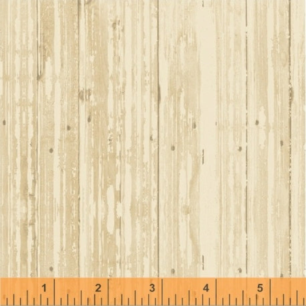 A woodgrain cream fabric with a visible measuring tape, indicating the texture and grain of the material.