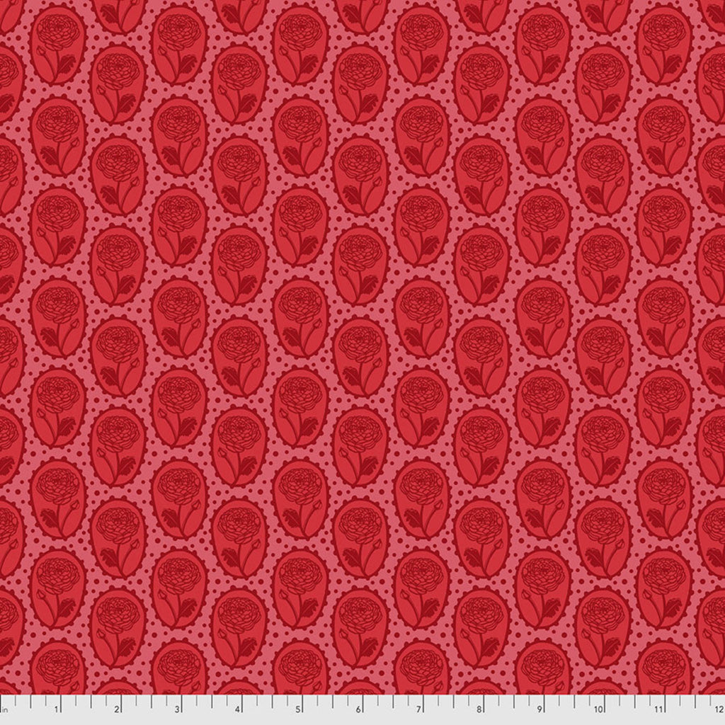 A fabric featuring a pattern of heart-shaped lockets in coral color on a red background.