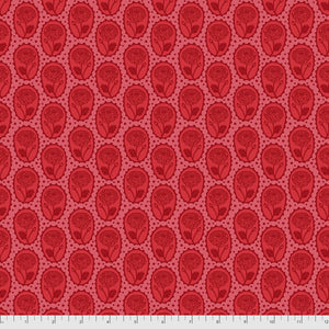 A fabric featuring a pattern of heart-shaped lockets in coral color on a red background.
