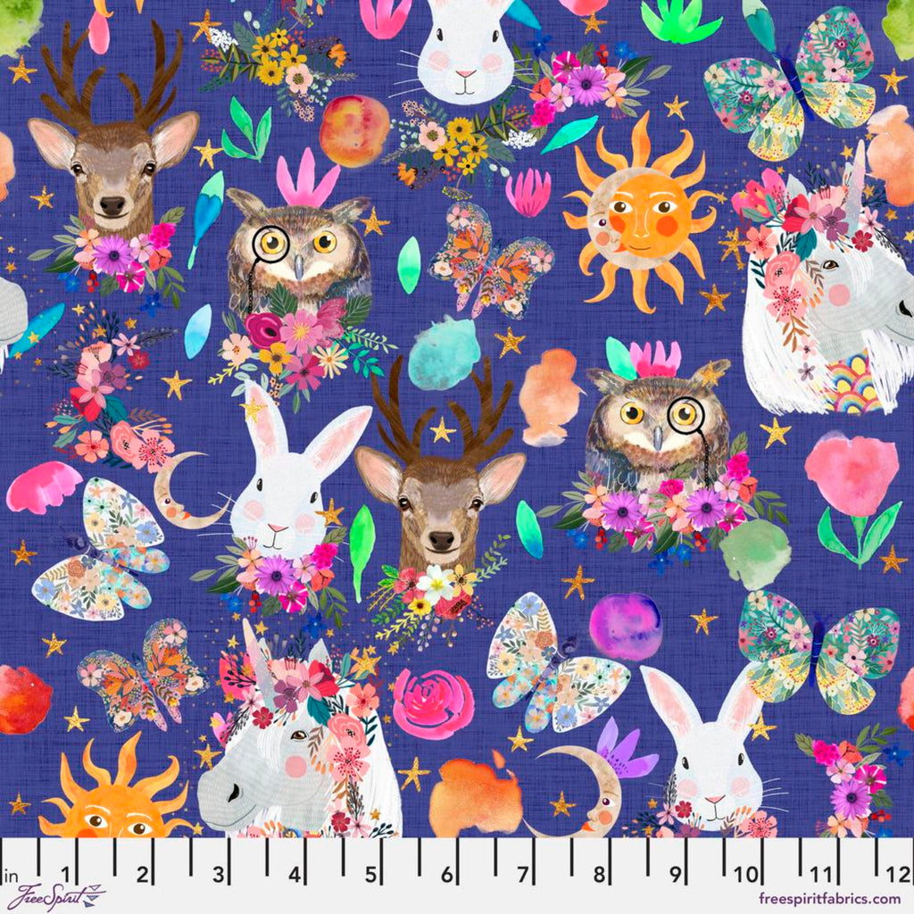 Colorful fabric pattern with animals, flowers, and celestial elements on a blue background.