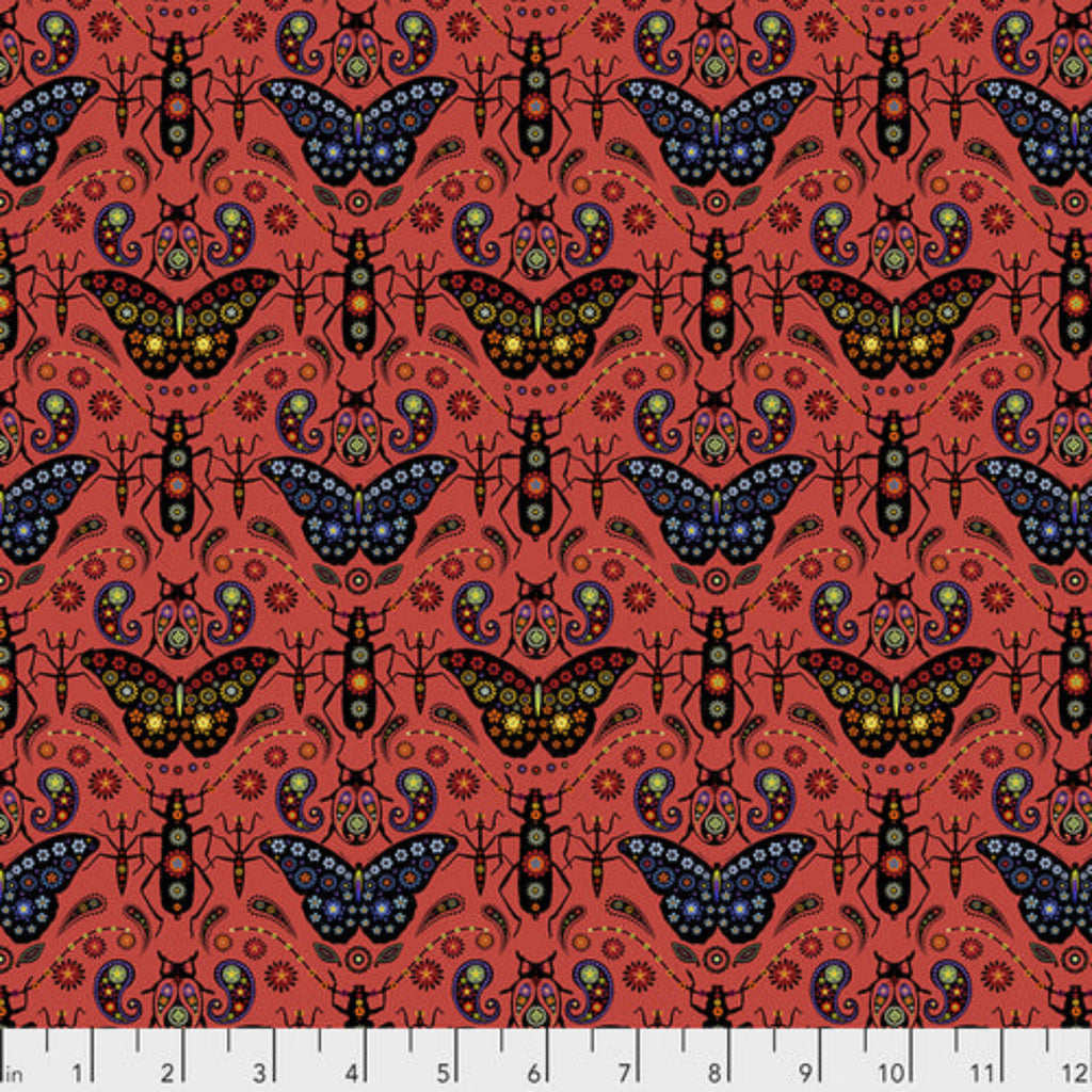 A pink fabric with a repeated pattern of butterflies and floral designs on a red background.