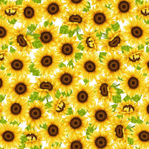 A fabric with a pattern of sunflowers on a white background, with green leaves and brown centers.