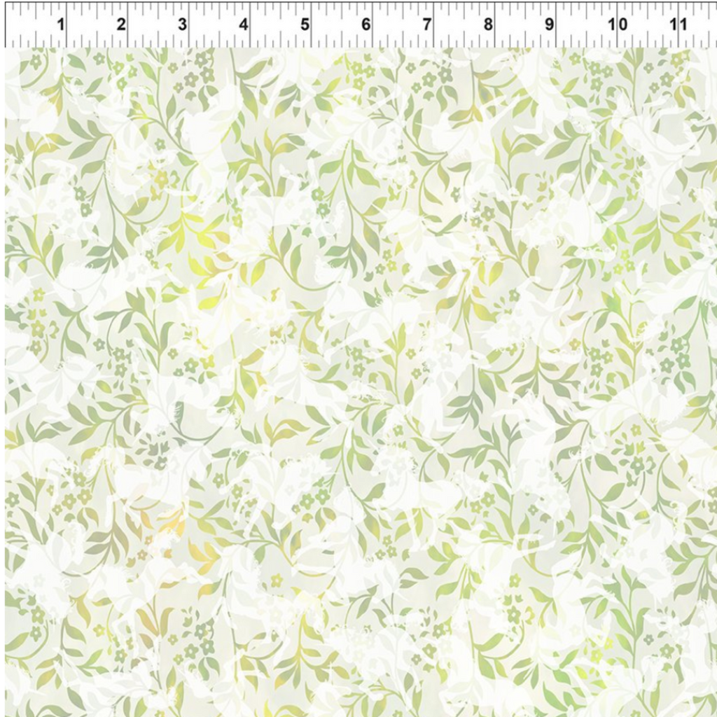 A fabric featuring a green vine pattern with white flowers