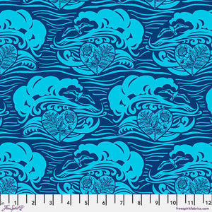 A fabric featuring a blue and turquoise floral pattern with large wave-like designs, labeled with a measurement scale and the brand Anna Maria Horner.