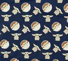 Camelot Fabrics - The Child Navy (Baby Yoda).Priced per 25cm